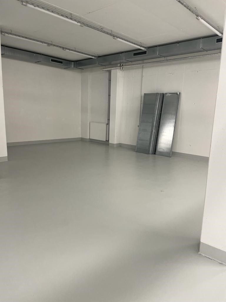 Empty basement with white walls